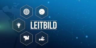 Visualisierung des Leitbildes, über eine Grafik, auf der der Begriff Leitbild im Mittelpunkt steht und dabei umgeben von fünf Sechsecken ist, indem jeweils ein Symbol abgebildet ist, z.B. ein Glühbirne oder eine Hand, aus der eine Pflanze wächst.